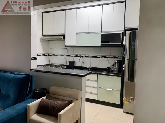 Imagem Apartamento à venda em Praia Grande-SP, bairro Ocian: 2 quartos, 1 suíte, 1 sala, 2 banheiros, 64m², garagem. Venha conferir!