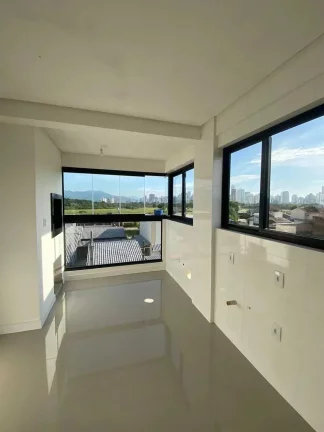 Imagem Apartamento com 2 dormitórios sendo 1 suíte e 1 vaga de garagem em Balneário Pereque