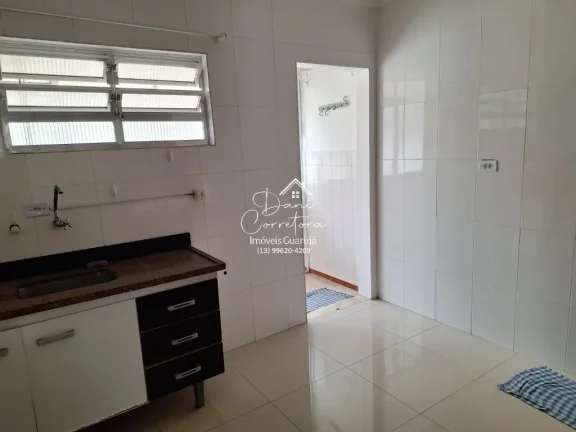 Imagem Imperdível oportunidade, apartamento de 2 quartos sem mobília na rua mais desejada do Guarujá-SP - 65m² - 1 vaga de garagem