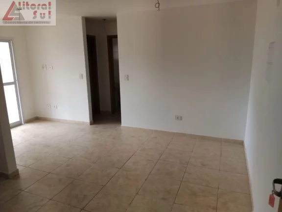 Imagem Apartamento à venda na Guilhermina, Praia Grande-SP: 2 quartos, 1 suíte, 1 vaga de garagem e 56m² de área. Adquira já!