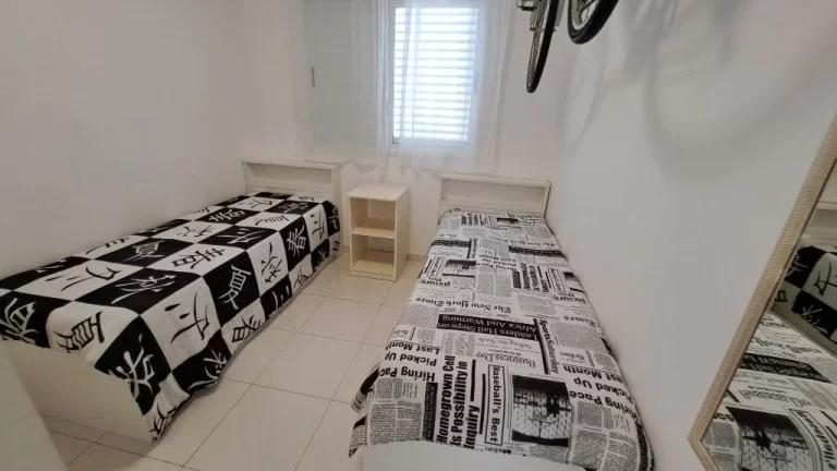 Imagem APARTAMENTO 30 METROS DA PRAIA DAS ASTÚRIAS COM 2 VAGAS PARA AUTO E LAZER