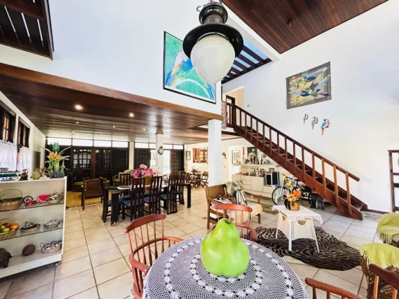 Imagem Imponente casa à venda em Riviera de São Lourenço Módulo 20: 5 quartos, 2 suítes, 3 salas, 4 vagas, 317m² de área.