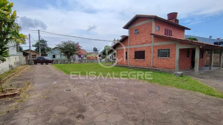 Imagem Sobrado + casa auxiliar em terreno de 1.864m² em Esteio
