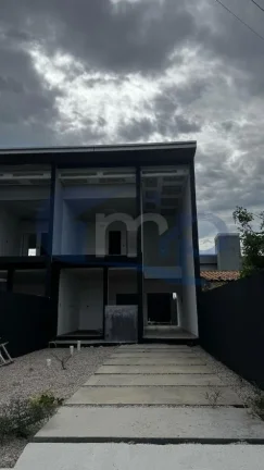 Sobrado Geminado á venda com 2 suítes no centro de Passo de Torres/SC