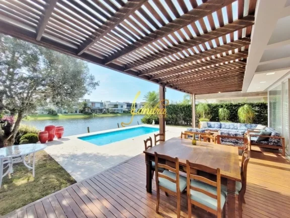 Imagem Casa condomínio com 05 suites e piscina aquecida
