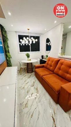 Imagem Apartamento com 2 dormitórios à venda, 46 m² por R$ 340.000,00 - Areia Branca - Santos/SP