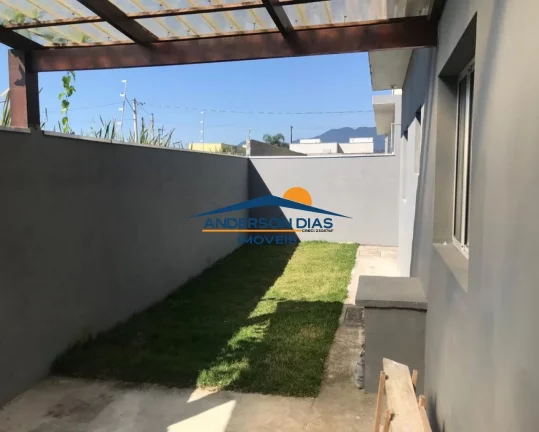 Imagem Casa com 2 dormitórios à venda, 70 m² por R$ 310.000 - Golfinho - Caraguatatuba/SP