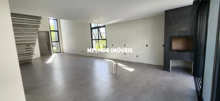 Imagem Casa Nova em condomínio fechado à venda com 5 suítes, 6 vagas de garagem localizada na Praia Brava .