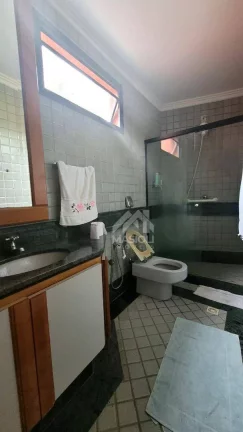 Imagem casa 4 quartos com 3 suítes, adega, piscina e área de churrasqueira.