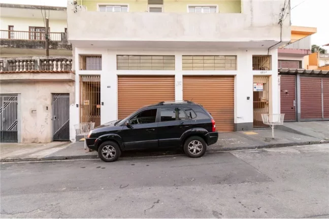 Imagem Sobrado com 5 casas e 1 galpão - Oportunidade de investimento ou moradia