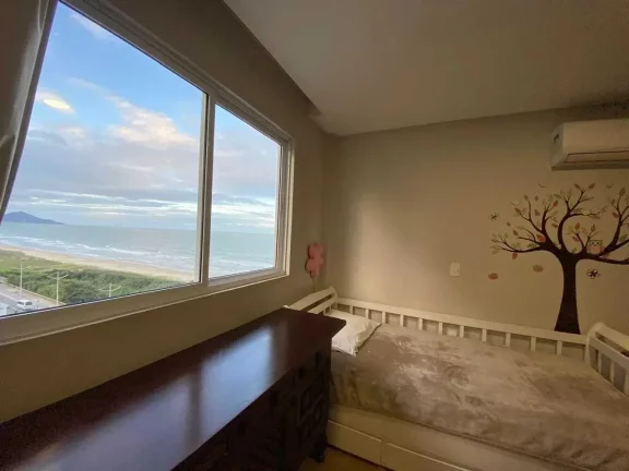 Imagem Apartamento frente mar com 3 suítes sendo 1 master e 2 vagas de garagem - Centro de Navegantes/SC