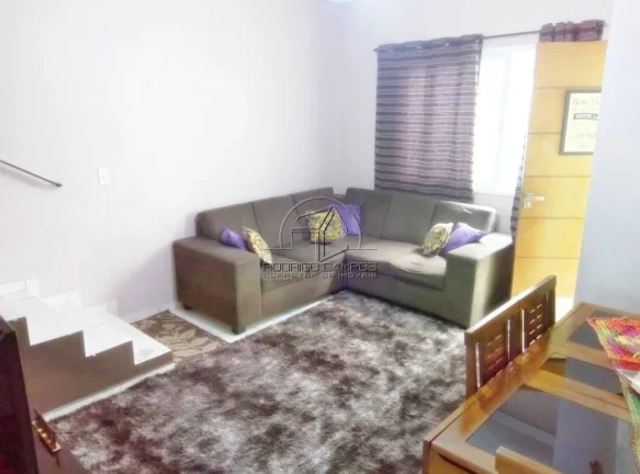 Imagem Casa Geminada à Venda em Tude Bastos, Praia Grande - 2 Quartos e Churrasqueira