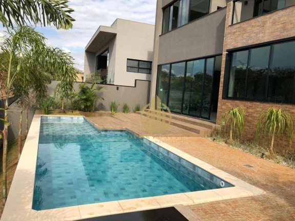 Imagem Sobrado com 4 suítes com piscina integrada na área de lazer no Alphaville