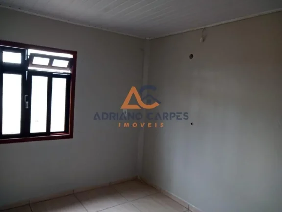 Imagem Casa com 2 dormitórios localizada no bairro Porto escalvados, em Navegantes - Adriano Carpes Imóveis Vende