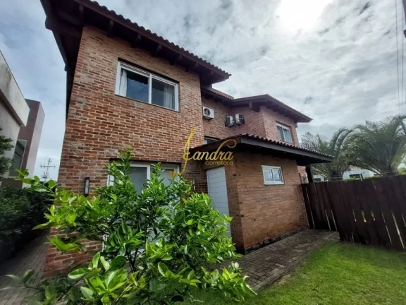 Imagem Sobrado semi-mobiliado em Atlântida em condomínio fechado