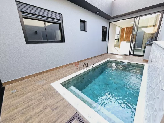Imagem Casa moderna com piscina e 3 suítes à venda, 140 m² por R$ 1.280.000 - Condomínio Jardim Brescia - Indaiatuba/SP
