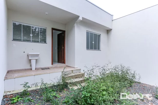 Imagem Casa térrea (geminada) - R$ 259.000,00 - Novinha - 61,02m2 - Bairro Bom Jesus/Rio Negro-Pr.