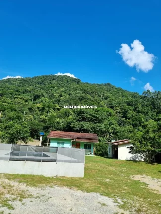 Imagem Chácara á venda com 2 casas, piscina, salão de festa localizada em Camboriú Santa Catarina