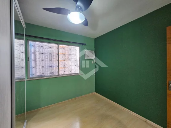 Imagem Casa à Venda na Taquara com 3 Quartos: Opção de Moradia e Negócios
