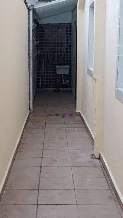 Imagem Casa tipo sobreposta baixa isolada, quintal com churrasqueira, 3 dormitórios à venda, 75 m² por R$ 480.000 - Marapé - Santos/SP
