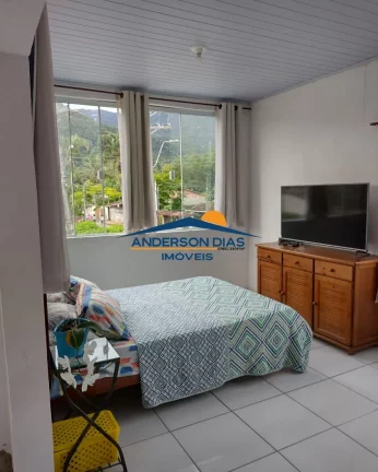 Imagem Casa com 3 dormitórios à venda, 72 m² por R$ 480.000 - Massaguaçu - Caraguatatuba/SP