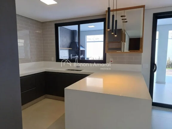 Imagem Esta linda residência combina elegância e conforto em um projeto com ambientes integrados e acabam...