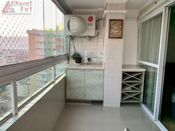 Imagem Apartamento à venda em Praia Grande-SP, bairro Ocian: 2 quartos, 1 suíte, 1 sala, 2 banheiros, 64m², garagem. Venha conferir!
