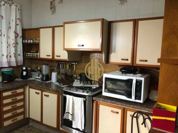Imagem Casa três dormitórios com edícula