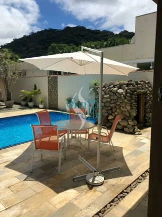 Imagem Casa Térrea à Venda em Condomínio no Horto Florestal - Ubatuba/SP.