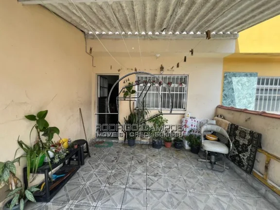 Imagem Sobrado Aconchegante à Venda em Nova Mirim, Praia Grande - 2 Quartos