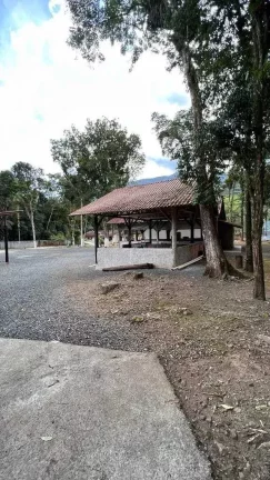 Imagem Chácara com casa de 3 dormitórios sendo 2 suítes e 8 vagas - Quiriri | Joinville/SC