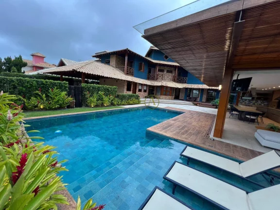 Imagem Casa em dois lotes a venda Condomínio Bougainville II piscina aquecida