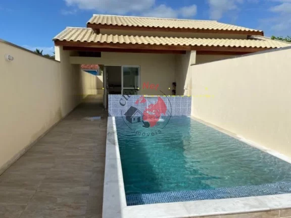 Imagem Casa Terrea , Nova sem uso prox a Praia 2 dorms c suite , quintal e piscina , 4 vagas ,bairro Gaivota,