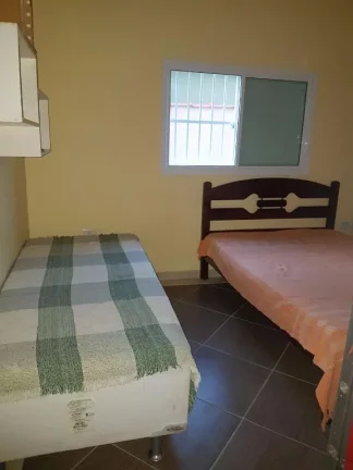 Imagem Sobrado à venda, 320 m² por R$ 1.200.000,00 - Maracanã - Praia Grande/SP