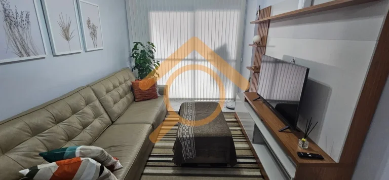 Imagem Imperdível! Apartamento à venda em Praia Grande-SP, Canto do Forte. 2 quartos, 1 suíte, 2 salas, 3 banheiros, 1 vaga. Condomínio Palm Beach, a 300m da praia.