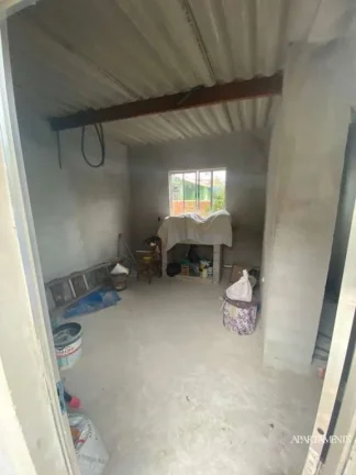 Imagem Terreno com 3 Casas com 3 vagas de carro e moto.