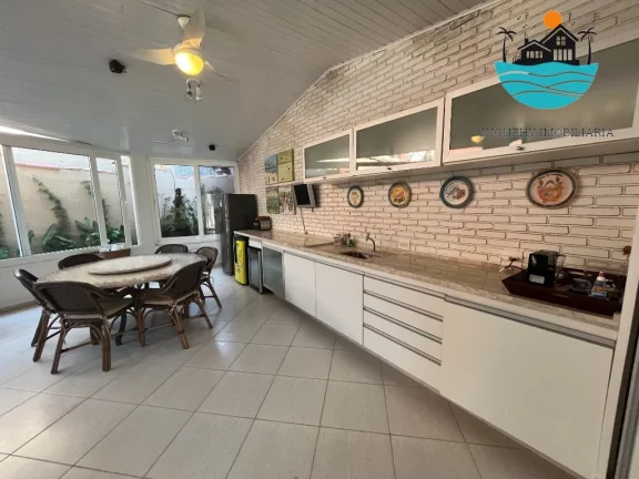 Imagem Alugar casa Juquehy - Casa em Condomínio 4 dormitórios, 3 suítes, 4 vagas, serviço e apoio de praia privativo - máx. 10 pessoas | Juquehy Imobiliária.