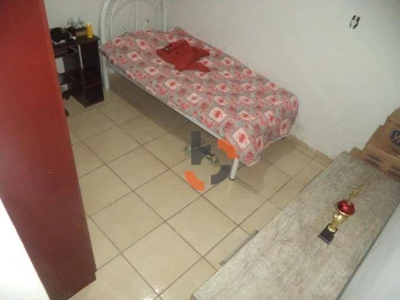 Imagem Oportunidade no Centro de NI: Casa Térrea com 2 Vagas a Pé do Calçadão