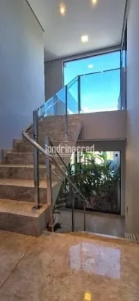 Imagem Sobrado de alto padrão em Cambé: 3 suítes, piscina aquecida, casa de visitas, pomar, energia solar e 3.000m² de terreno amplo