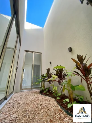 Imagem Casa de alto padrão com 3 suítes, cozinha gourmet e piscina com cascata