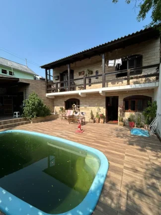 Imagem Casa com 2 Dormitorio(s) localizado(a) no bairro Jardim Krahe em Viamão / Rio Grande do Sul Ref.:57580517