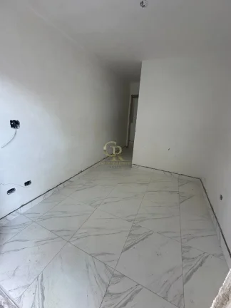 Imagem Apartamento à venda na Guilhermina, Praia Grande-SP: 1 quarto, 1 suíte, 1 sala, 2 banheiros, 51m² de área.