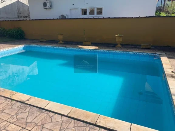 Imagem Casa em Condomínio para Venda em Ubatuba / SP no bairro Horto Florestal