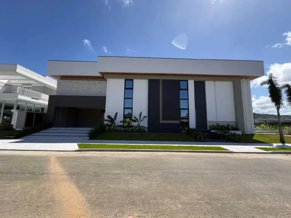 Imagem Casa alto padrão em condomínio fechado, 4 suítes sendo 1 master e 4 vagas, em Camboriú/SC
