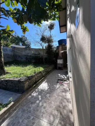 Imagem Terreno de 340m² com casa de 2 dormitórios e 1 vaga de garagem Zimbros
