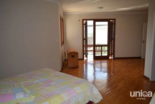 Imagem Casa em Camobi com 05 dormitórios, suíte master, lareira, piscina