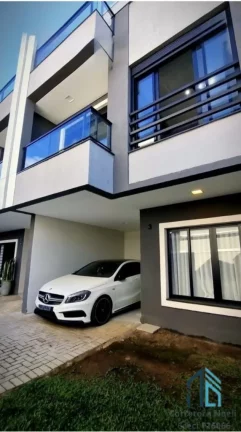 Imagem Sobrado triplex, 03 quartos c/suíte, terraço com área gourmet e banheiro no Xaxim em Curitiba PR