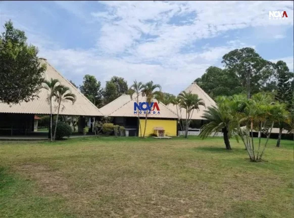 Imagem Conheça esta deslumbrante casa triplex, com 280m de área privativa, localizada no condomínio no R...