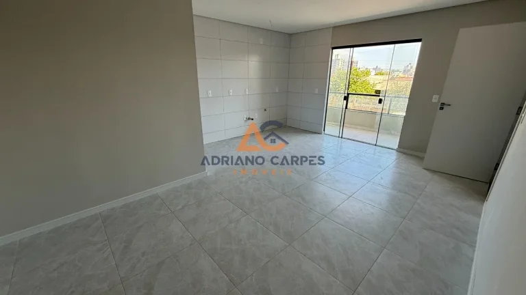 Imagem Apartamento NOVO de dois dormitórios, sendo uma suíte, sacada com churrasqueira e uma vaga de garagem no bairro de Gravatá, em Navegantes -