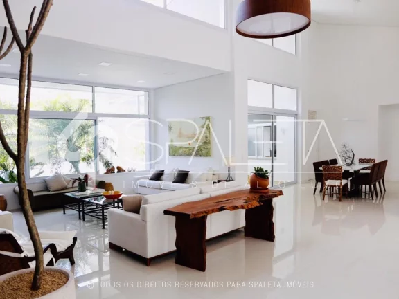 Imagem Oásis de Luxo: Casa térrea com piscina, sauna e píer privativo à venda no condomínio Marina Guarujá